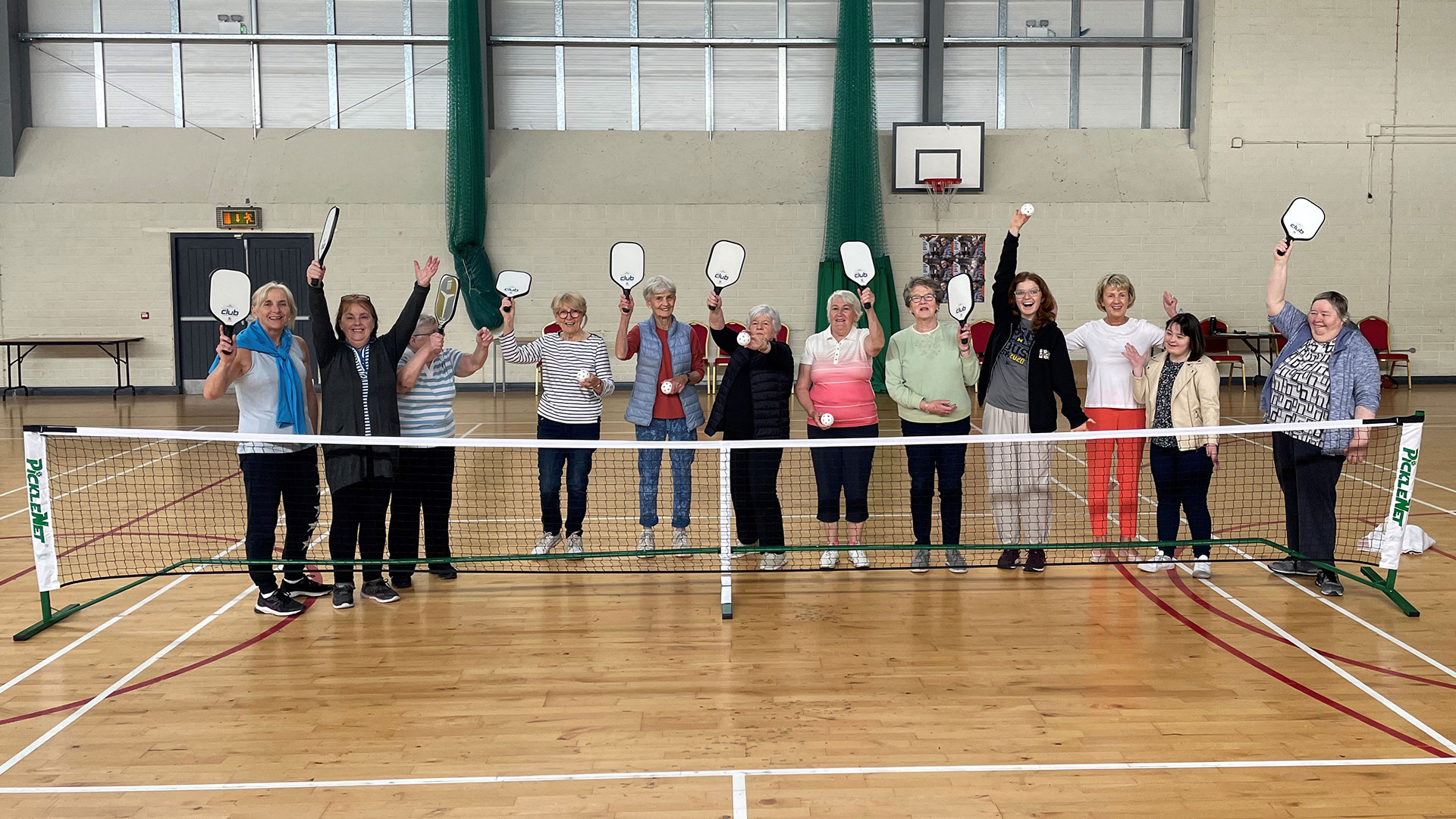 Older People holding rackets
