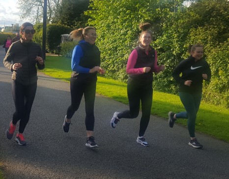 Four women jogging