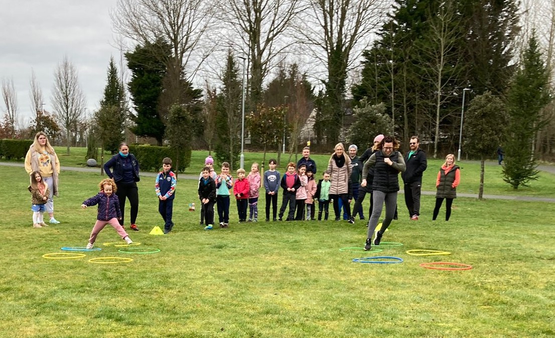 Families doing activities in park