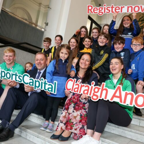 Ministers & children holding sign to register now